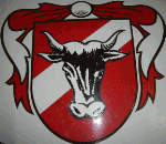 Wappen mit Kuhkopf im roten Schild, umrahmt von roten Bändern.