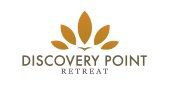 Logo with five orange leaves above the text "Discovery Point Retreat".