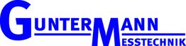 Logo der Firma Guntermann Messtechnik in blauer Schrift mit Unterstreichungen.