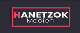 Logo mit Text: "HANETZOK Medien", weißer Text auf dunklem Hintergrund, umrahmt in Rot.