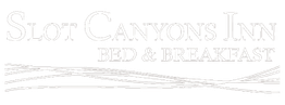 Slot Canyons Inn Bed & Breakfast logo with decorative lines below the text.
