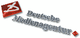 Logo der Deutschen Medienagentur mit rotem Symbol und silbernem Text auf weißem Hintergrund.