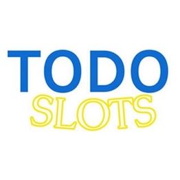 Texto "TODO SLOTS" en azul y amarillo sobre fondo blanco.