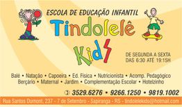 Cartaz da Escola Infantil Tindolelê Kids com contato e atividades como balé e natação.