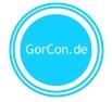 Logo mit blauem Kreis und Schriftzug "GorCon.de" in der Mitte.