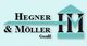 Logo mit Text "Hegner & Möller GmbH", daneben ein stilisiertes Haus mit den Buchstaben HM.
