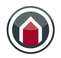 Rundes Logo mit einem roten und weißen Haus-Symbol auf grauem Hintergrund.