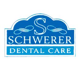 Blue logo reading "Schwerer Dental Care" with an 'S' and decorative lines above and below.