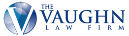 Logo of The Vaughn Law Firm with a stylized "V" in a blue circle.