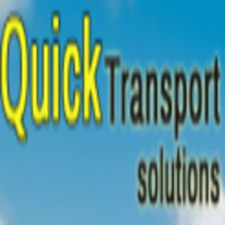 Blurry "Quick Transport Solutions" text on a blue sky background.