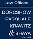 Blue sign for Law Offices of Doroshow, Pasquale, Krawitz & Bhaya, established in 1978.