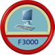 Emblem mit Computer und Tastatur, darunter Text "F3000", umrahmt von rotem Kreis.
