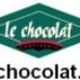 Logo von le-chocolat.de mit grünem Hintergrund und weißer Schrift. Text: "le chocolat".