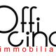 Logo con la scritta nera "Officina" e rossa "immobiliare" su sfondo bianco.