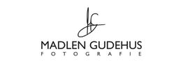 Logo von "Madlen Gudehus Fotografie" mit stilisiertem Monogramm darüber.