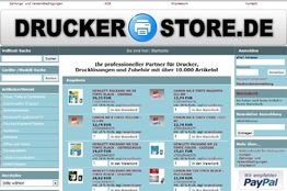 Website-Layout von Druckerzubehör-Anbieter mit Such- und Anmeldefeldern, Produkten und PayPal-Logo.