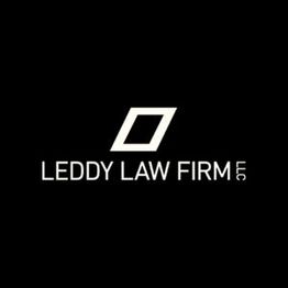 Logo of Leddy Law Firm with a stylized geometric shape on a black background.