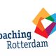 Logo met vier gekleurde vierkanten en tekst "Coaching Rotterdam".