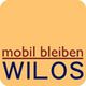 Orange Hintergrund mit dem Text "mobil bleiben WILOS" in Schwarz und Blau.
