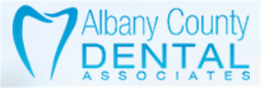 Logo of Albany County Dental Associates with a tooth graphic.