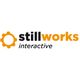 Logo von "stillworks interactive" mit Zahnrad-Symbol in Orange und schwarzem Text.