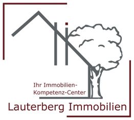 Logo von Lauterberg Immobilien mit Baum und Hausumriss. Text: "Ihr Immobilien-Kompetenz-Center".