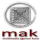 Logo von mak: Ein stilisierter, silberner Würfel in einem Kreis über rotem Text "multimedia agentur kuno".
