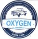 Logo von Oxygen Customs mit altem Pickup, Werkstatt und Tuning seit 2010.