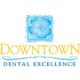 Logo showing a blue floral design above the words "Downtown Dental Excellence" in yellow and blue.