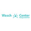 Logo mit Text "Wasch Center Margaretenhof" und blauer Blume in der Mitte.