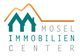 Logo mit zwei stilisierten Häusern und Text "Mosel Immobilien Center" in Grün und Braun.