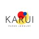 Logo de Karui Paper Jewelry con formas geométricas en rojo, azul y amarillo sobre fondo blanco.