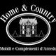 Logo "Home & Country" con casa stilizzata, mobili e complementi d'arredo.