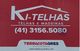Placa vermelha com logo "KI-TELHAS", telefone (41) 3156.5080 e "TERRACOTAGRES".