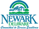 Logo of Newark, Delaware with buildings, trees, and motto: "Committed to Service Excellence."