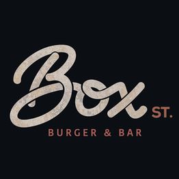 Logo com fundo preto e texto "Box ST. BURGER & BAR" em letras estilizadas.