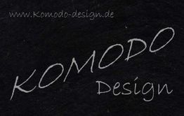 Schwarzer Hintergrund mit weißem Text: "www.Komodo-design.de" und "KOMODO Design".