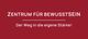 Roter Hintergrund mit weißem Text: "Zentrum für Bewusstsein. Der Weg in die eigene Stärke!"