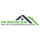 Logo von RM Immobilien: Hausdach-Symbol mit dem Text „Mit uns schlüsselfertig bauen!“