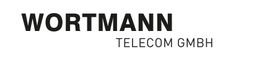 Text "WORTMANN TELECOM GMBH" auf weißem Hintergrund in schwarzer Schrift.