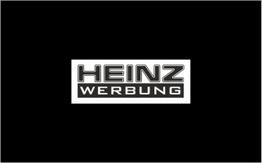 Schwarzes Bild mit weißem Logo "Heinz Werbung" in der Mitte.
