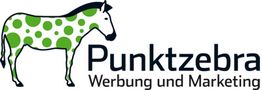 Zebra mit grünen Punkten, daneben der Text "Punktzebra - Werbung und Marketing".