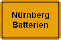 Gelbes Schild mit der Aufschrift "Nürnberg Batterien".