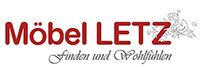 Logo mit Text "Möbel LETZ", darunter "finden und wohlfühlen", stilvolles Design.
