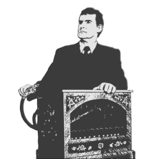 Ein Mann steht mit einer Drehorgel und schaut nach links.