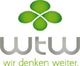 Grünes Kleeblatt über dem Text "wtw" und "wir denken weiter" in Grau.