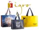 Drei bunte Einkaufstaschen mit Logo und Beschriftungen vor einem "igro" Schriftzug.