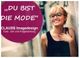 Lächelnde Frau mit Brille an Wand; Text: "Du bist die Mode" CLAUSS Imagedesign.