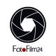 Logo de FotoFilm24 con una apertura de cámara negra sobre fondo blanco.