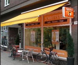 Der Eingang zum Salon